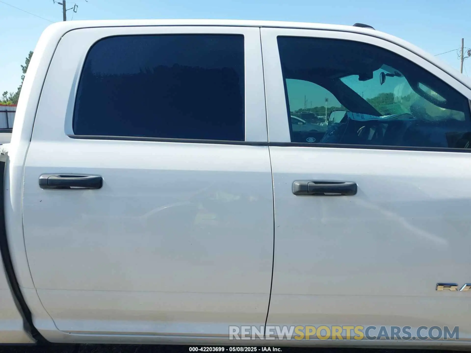 14 Photograph of a damaged car 3C6UR5CJ9MG641813 RAM 2500 2021