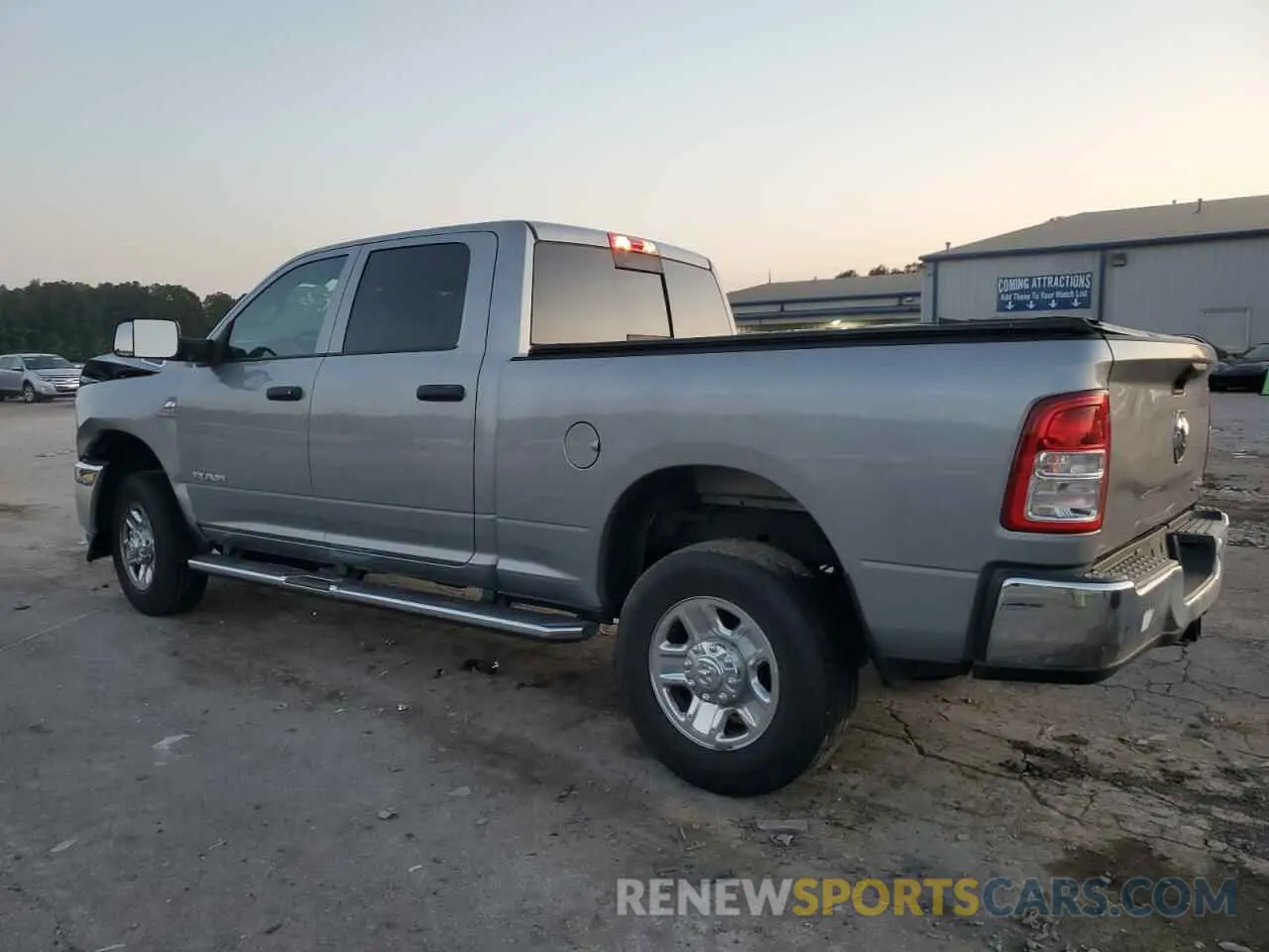 2 Photograph of a damaged car 3C6UR5CL4MG631756 RAM 2500 2021