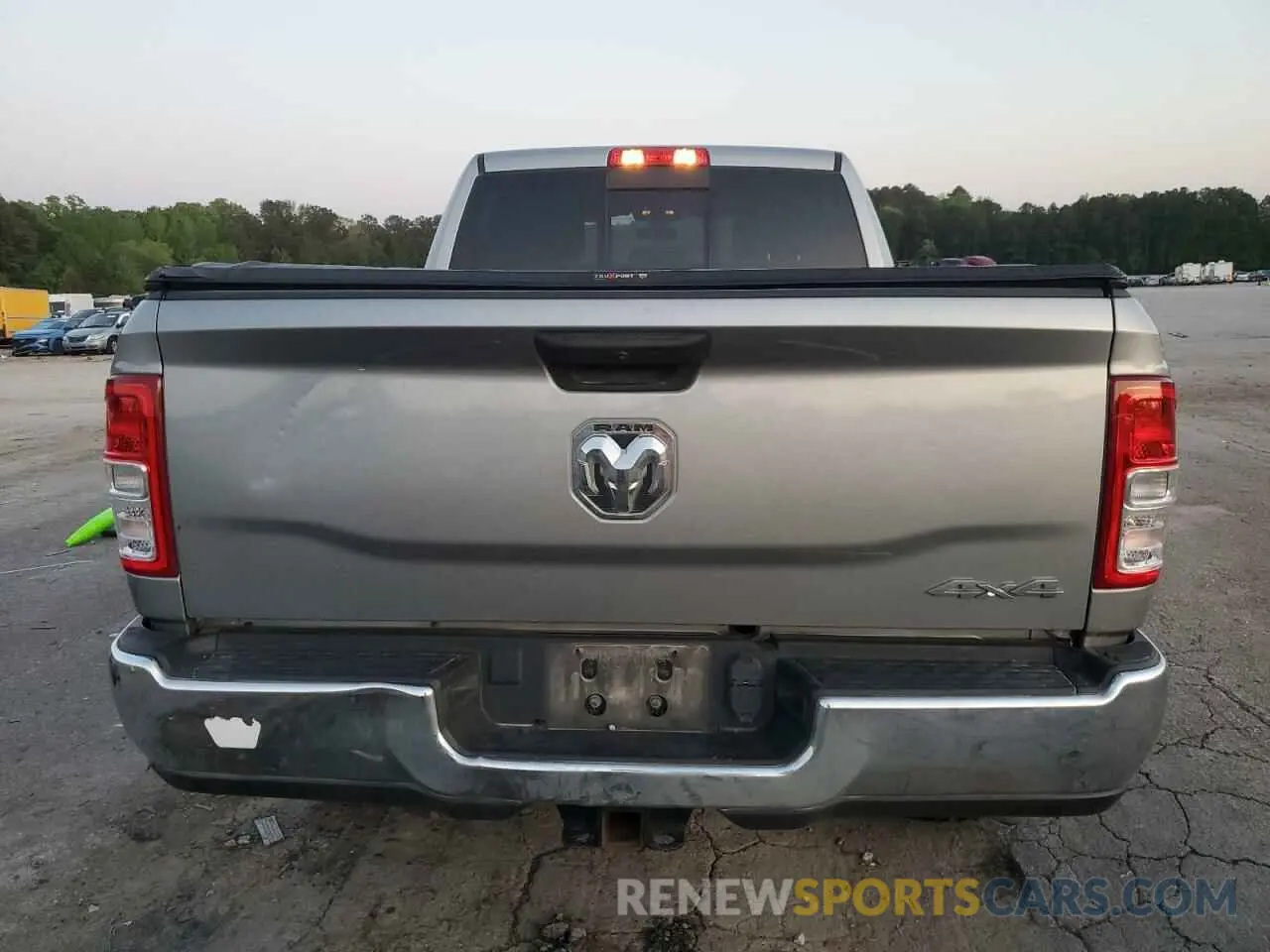 6 Photograph of a damaged car 3C6UR5CL4MG631756 RAM 2500 2021