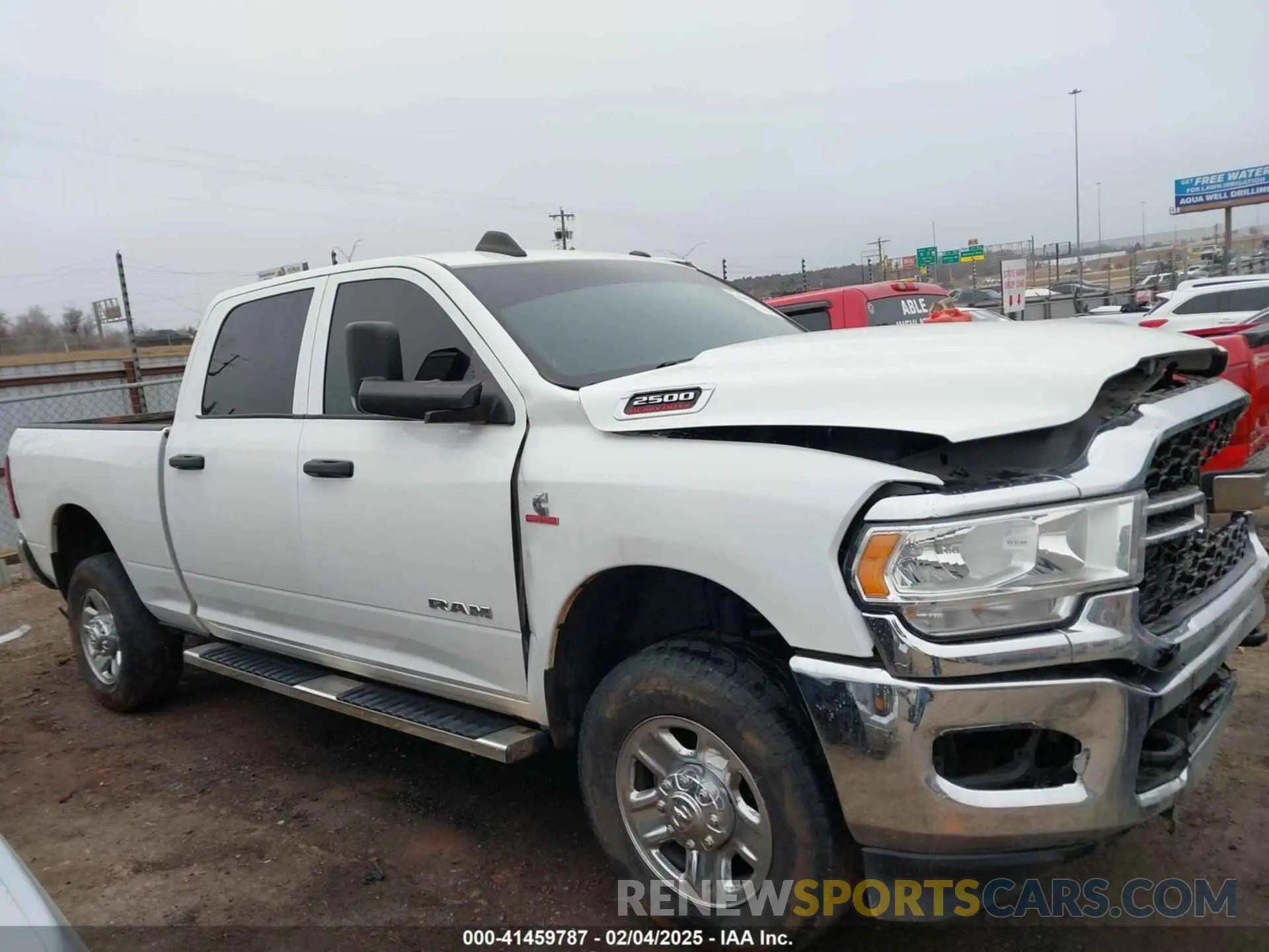 13 Photograph of a damaged car 3C6UR5CLXMG632197 RAM 2500 2021
