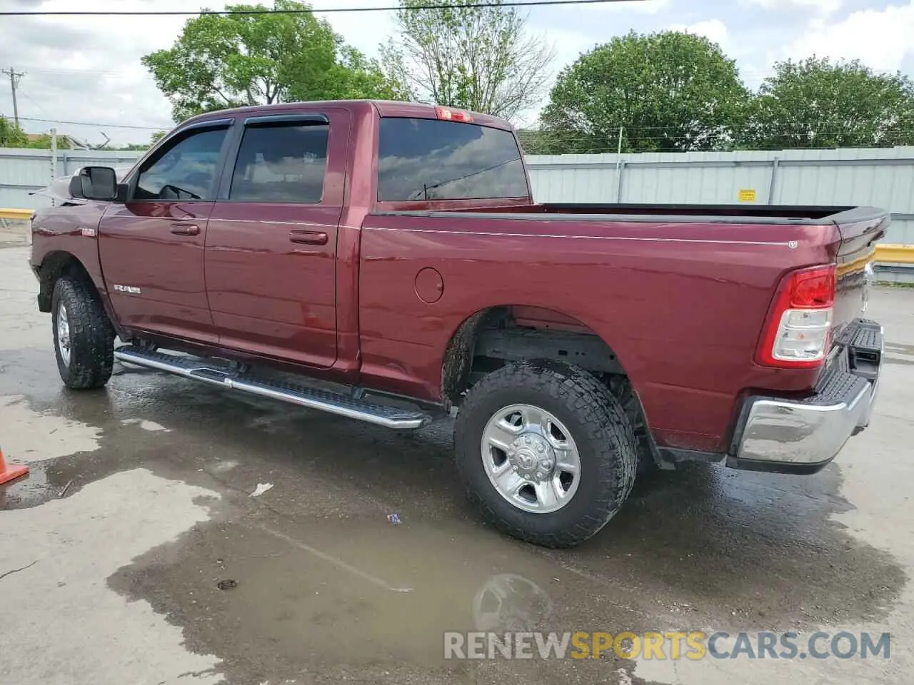 2 Photograph of a damaged car 3C6UR5DJ7MG556130 RAM 2500 2021