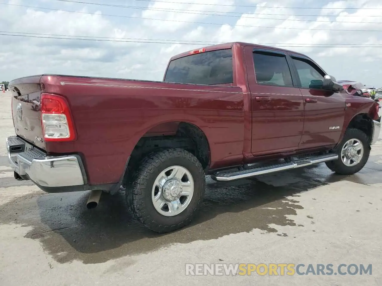 3 Photograph of a damaged car 3C6UR5DJ7MG556130 RAM 2500 2021