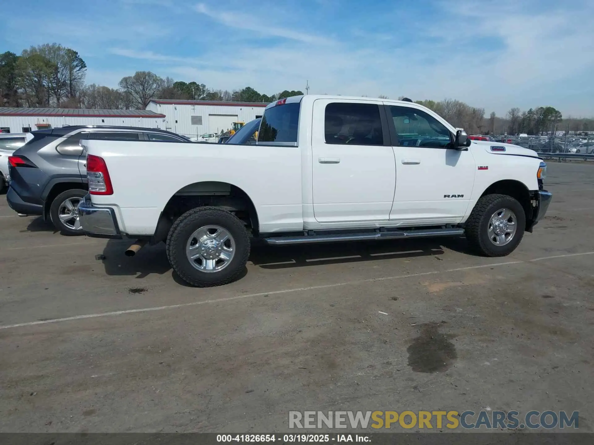 13 Photograph of a damaged car 3C6UR5DJ8MG552586 RAM 2500 2021