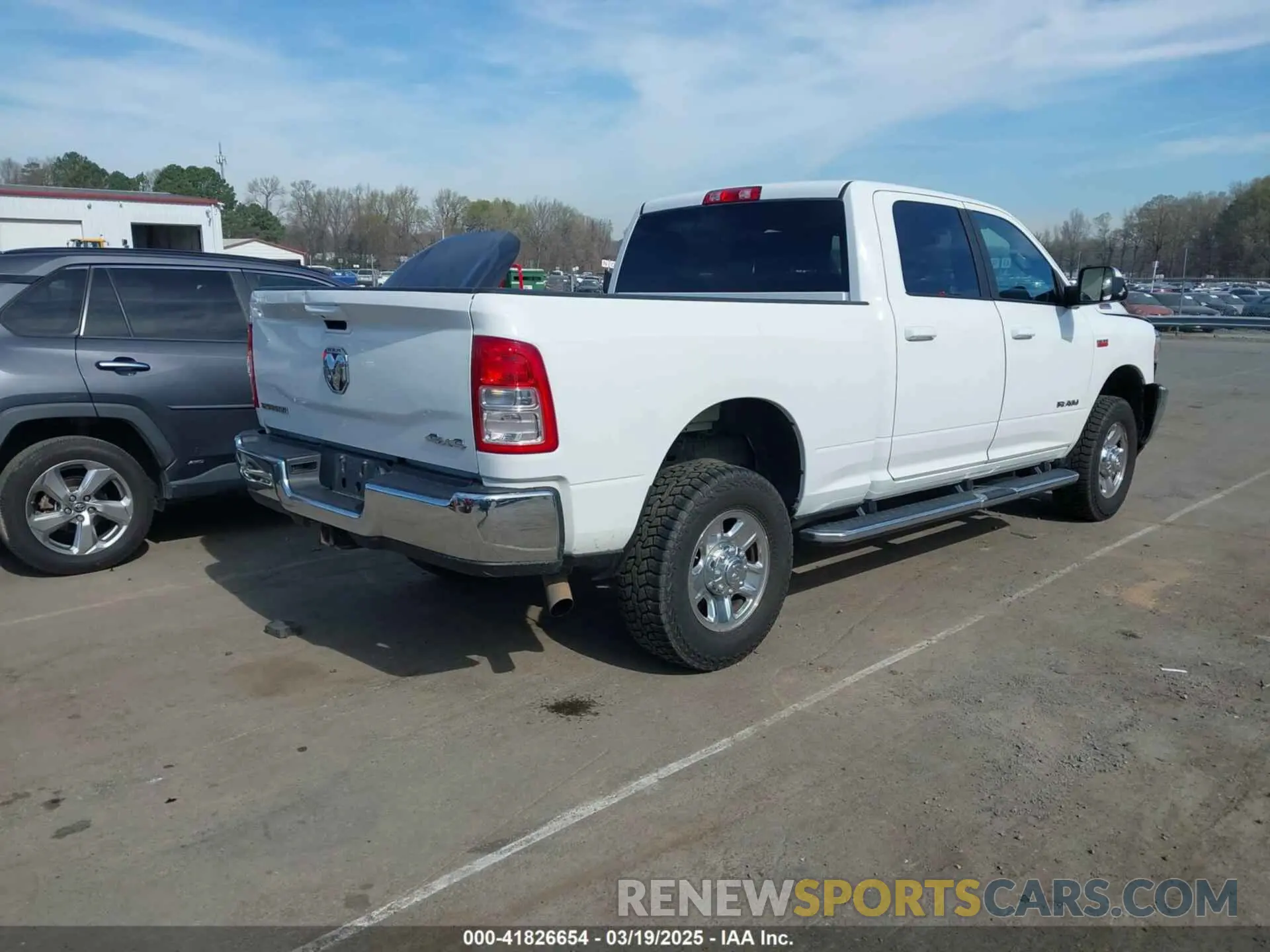 4 Photograph of a damaged car 3C6UR5DJ8MG552586 RAM 2500 2021