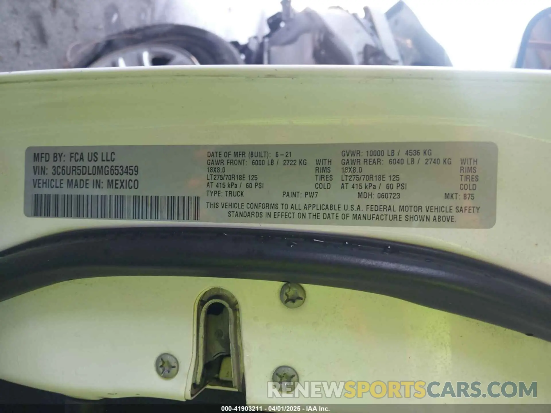 9 Photograph of a damaged car 3C6UR5DL0MG653459 RAM 2500 2021