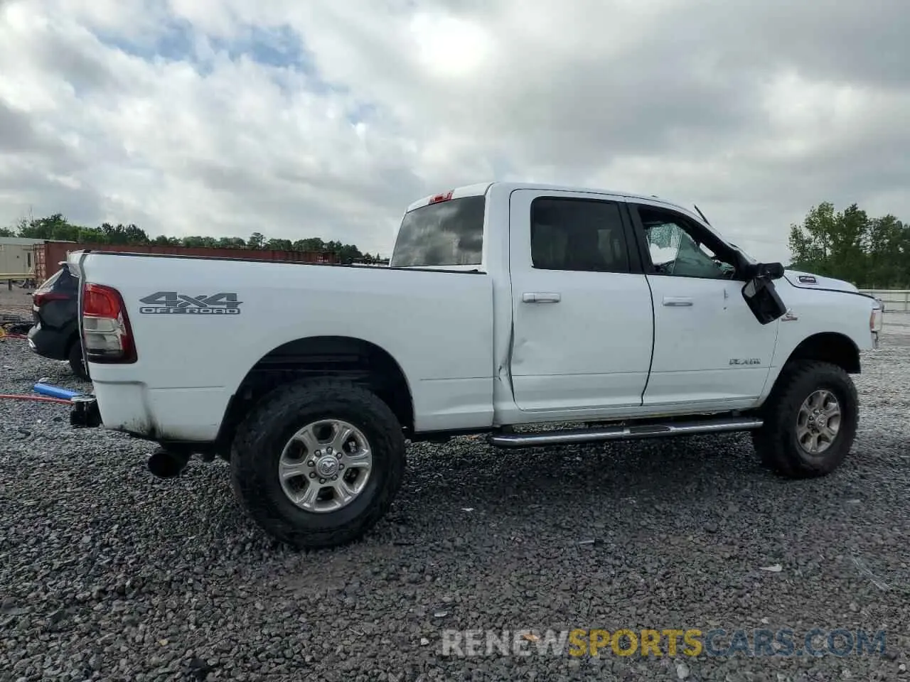 3 Photograph of a damaged car 3C6UR5DL0MG656149 RAM 2500 2021