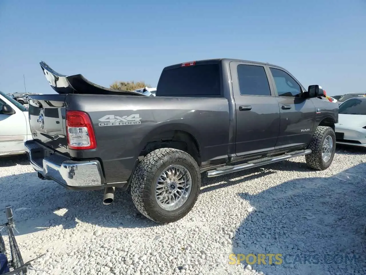 3 Photograph of a damaged car 3C6UR5DL1MG516451 RAM 2500 2021