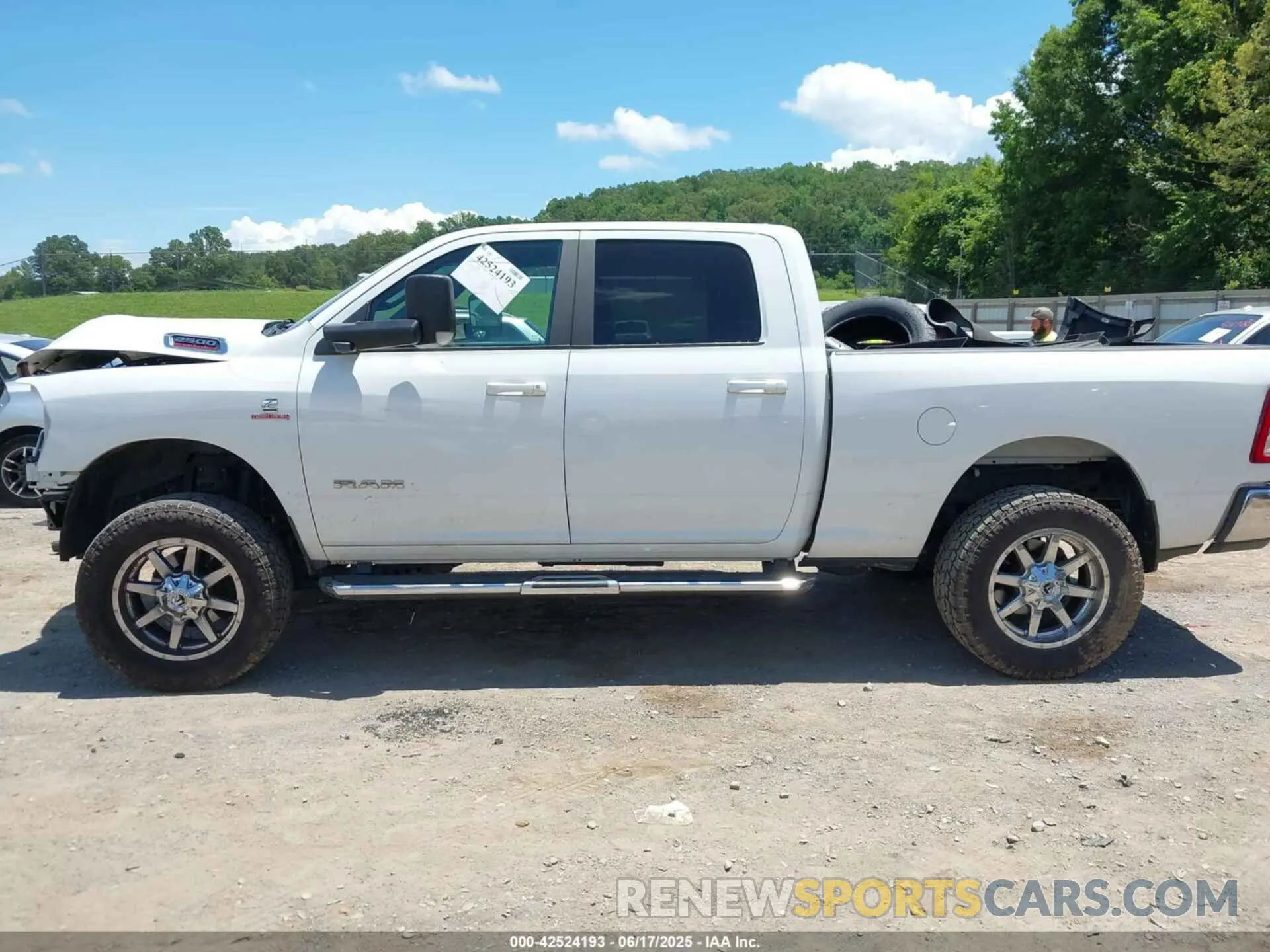 14 Photograph of a damaged car 3C6UR5DL1MG554827 RAM 2500 2021