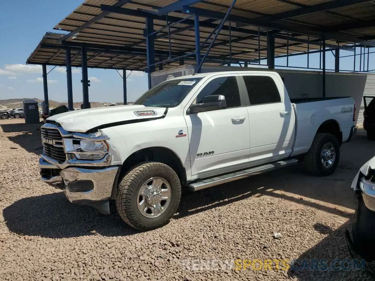 1 Photograph of a damaged car 3C6UR5DL1MG678113 RAM 2500 2021