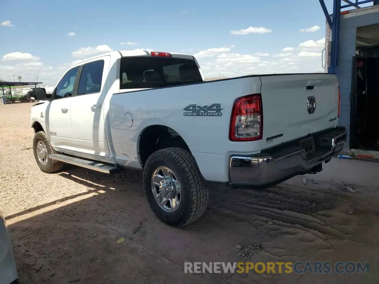2 Photograph of a damaged car 3C6UR5DL1MG678113 RAM 2500 2021