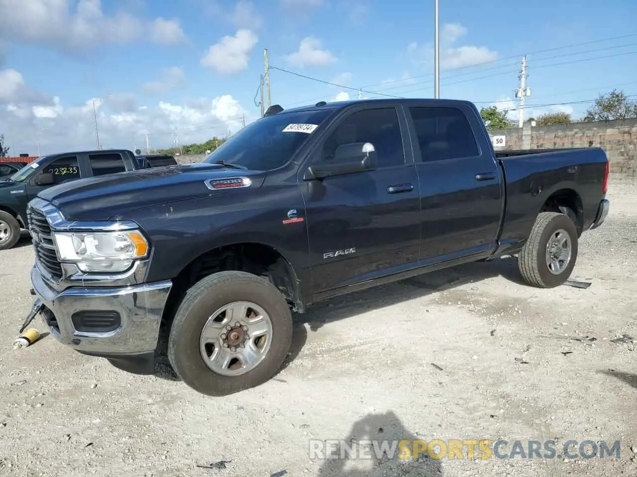 1 Photograph of a damaged car 3C6UR5DL5MG507395 RAM 2500 2021