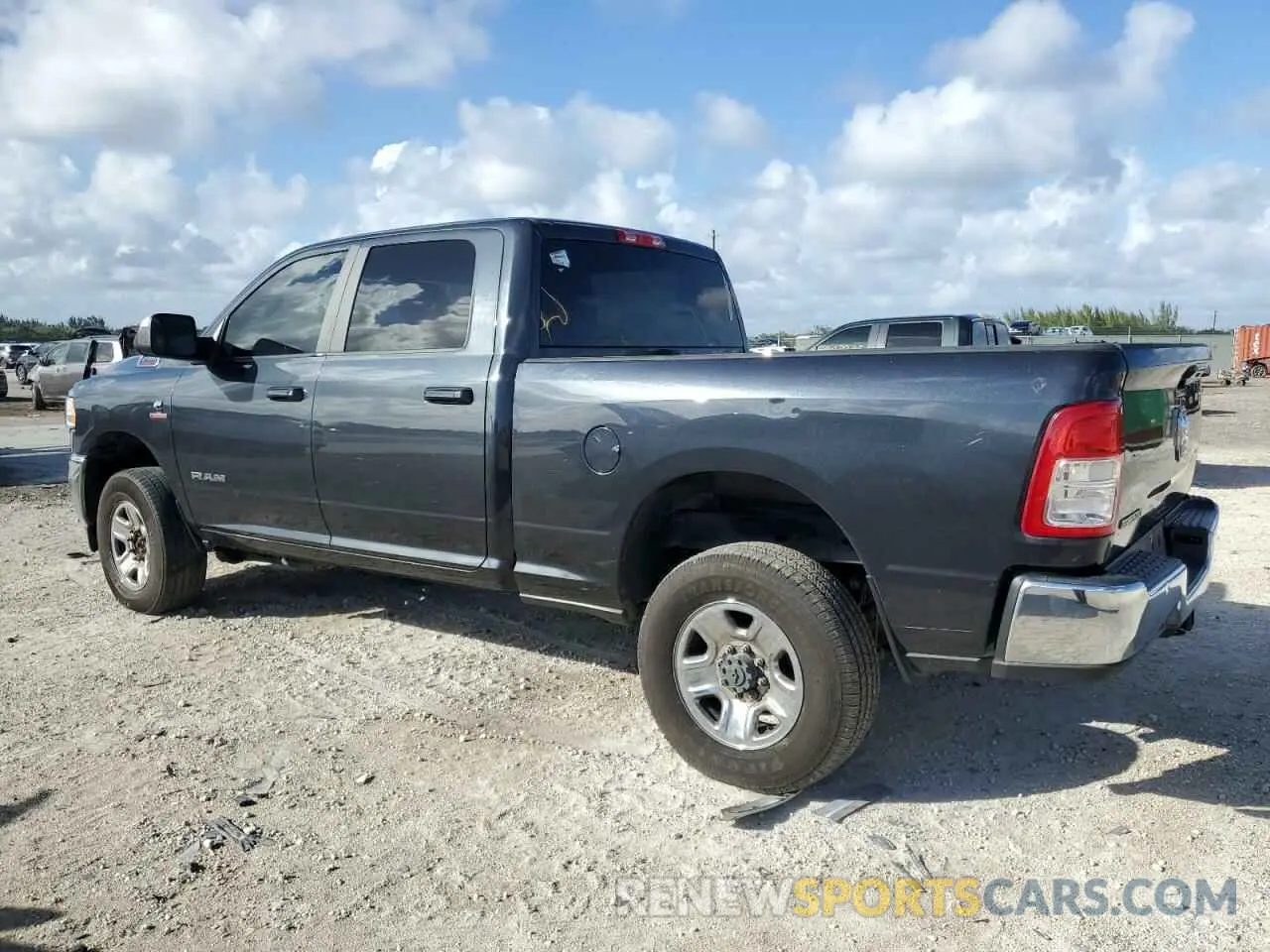 2 Photograph of a damaged car 3C6UR5DL5MG507395 RAM 2500 2021