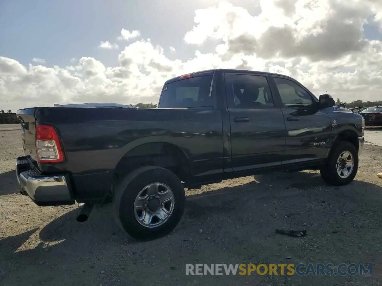 3 Photograph of a damaged car 3C6UR5DL5MG507395 RAM 2500 2021
