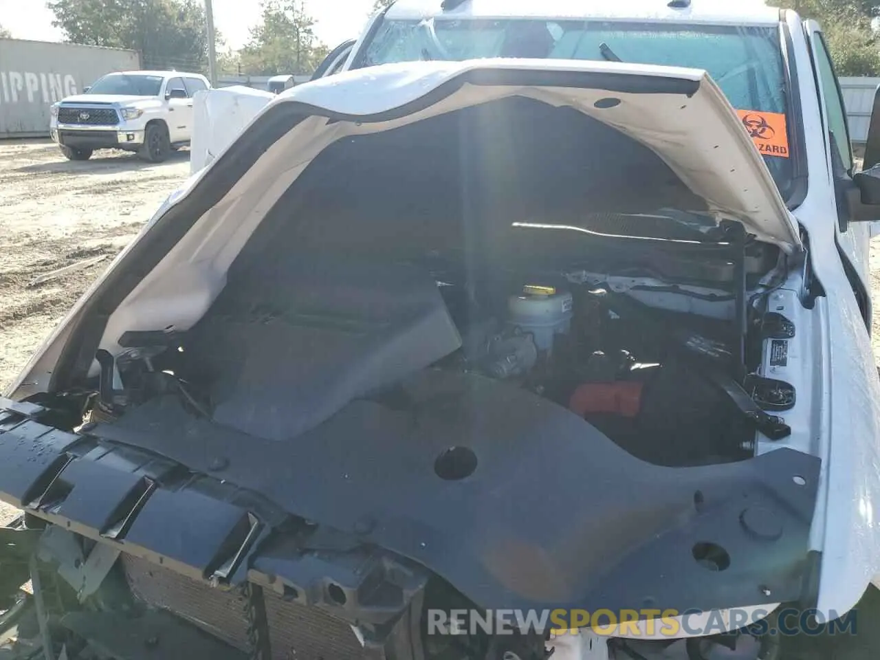 11 Photograph of a damaged car 3C6UR5DL6MG522987 RAM 2500 2021
