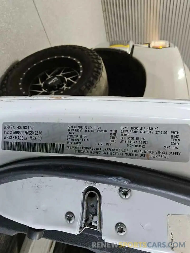 12 Photograph of a damaged car 3C6UR5DL7MG542214 RAM 2500 2021