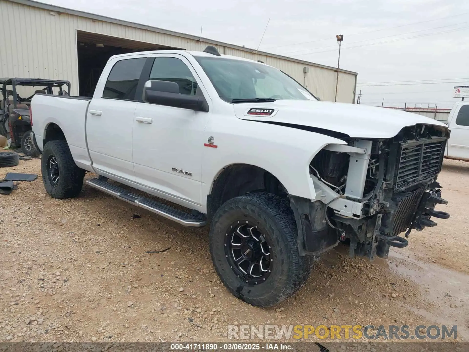 1 Photograph of a damaged car 3C6UR5DL8MG605823 RAM 2500 2021