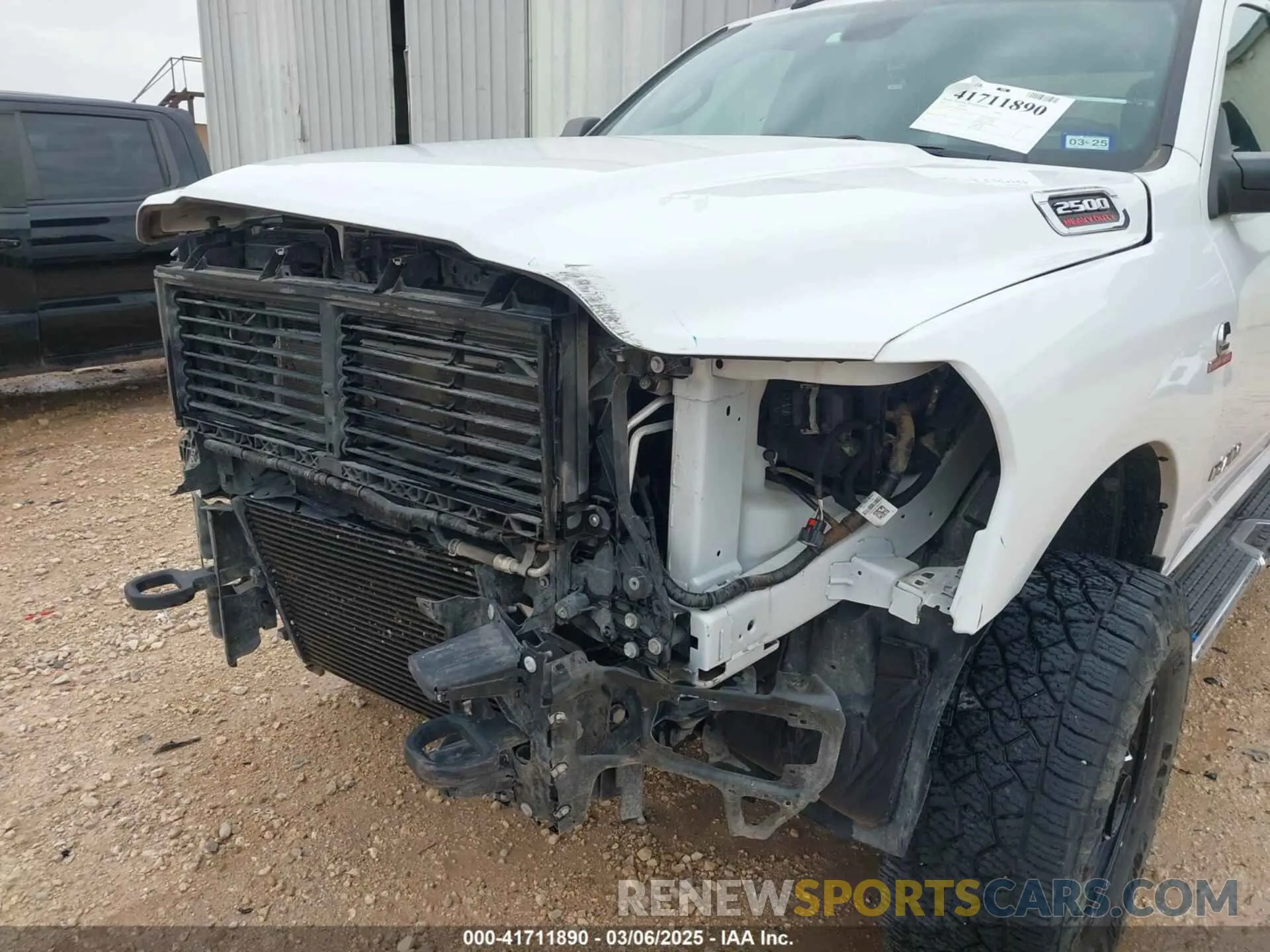19 Photograph of a damaged car 3C6UR5DL8MG605823 RAM 2500 2021