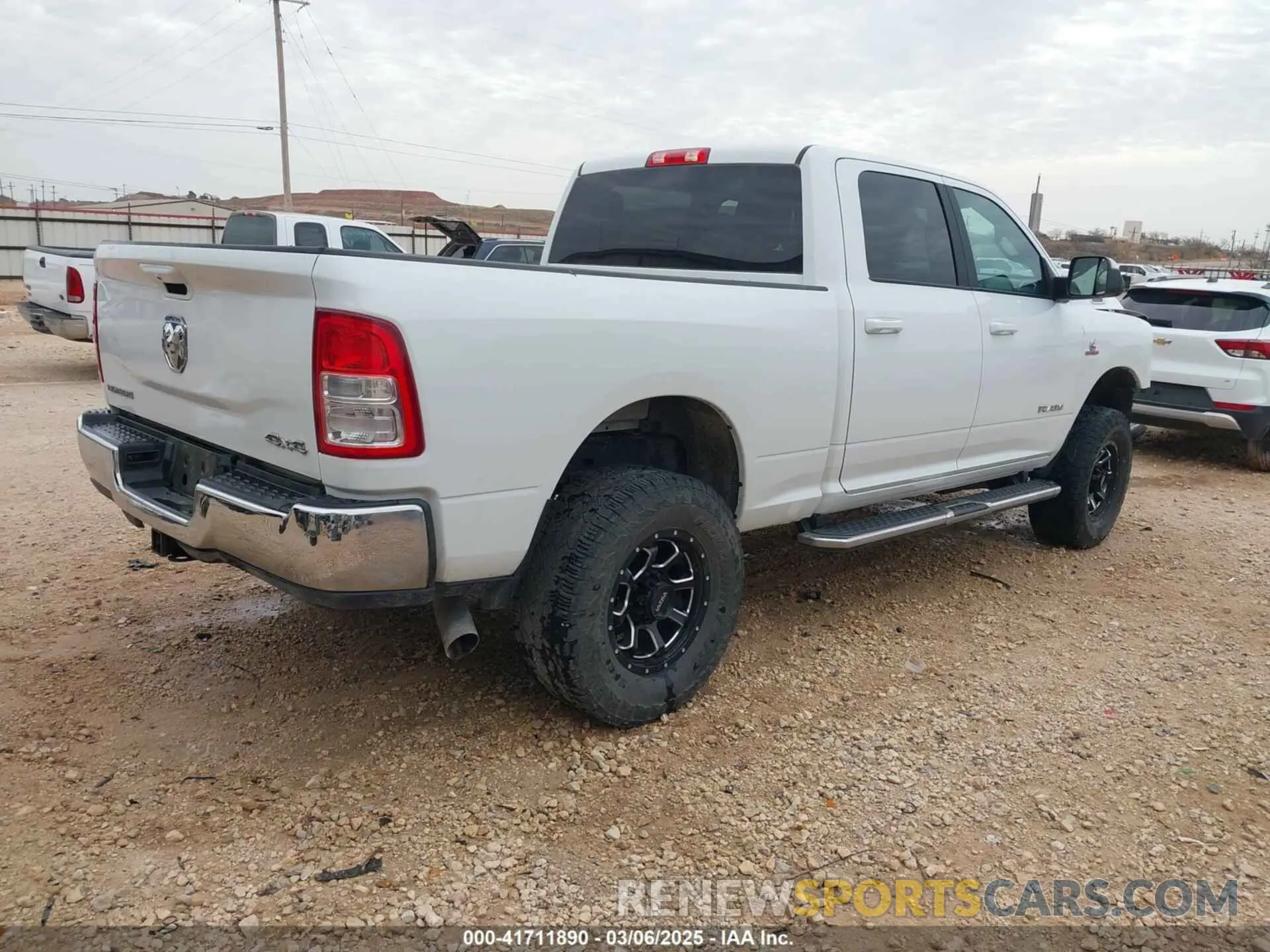 4 Photograph of a damaged car 3C6UR5DL8MG605823 RAM 2500 2021