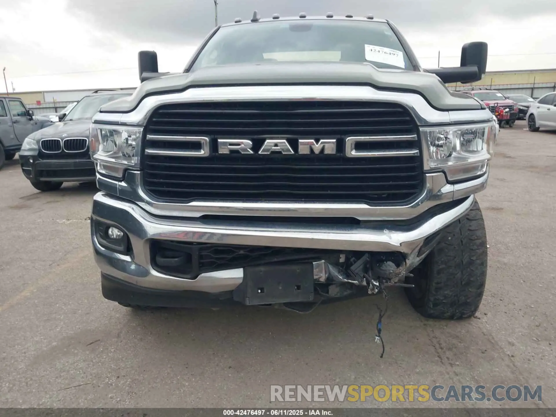 12 Photograph of a damaged car 3C6UR5DL8MG654830 RAM 2500 2021