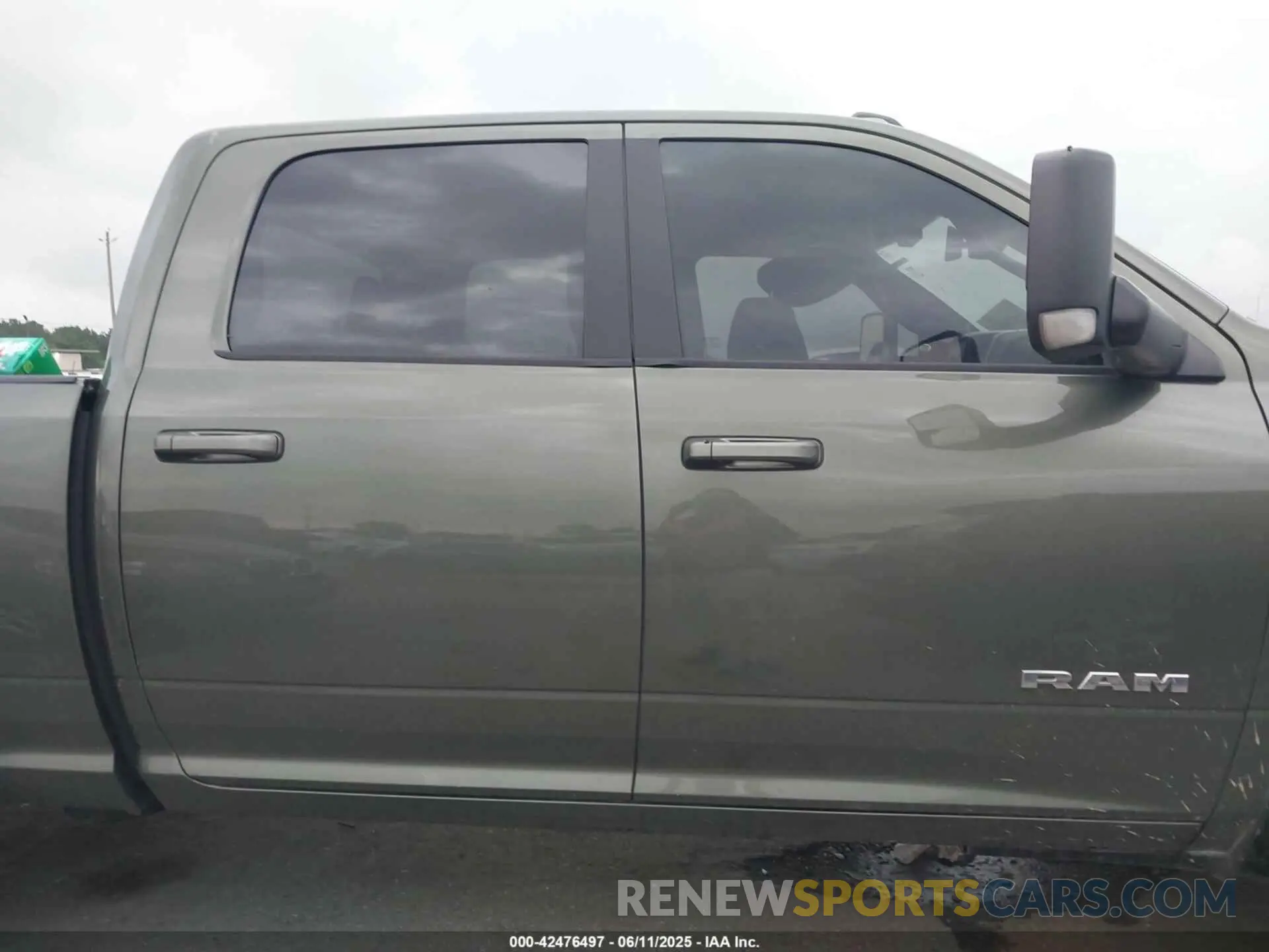 13 Photograph of a damaged car 3C6UR5DL8MG654830 RAM 2500 2021