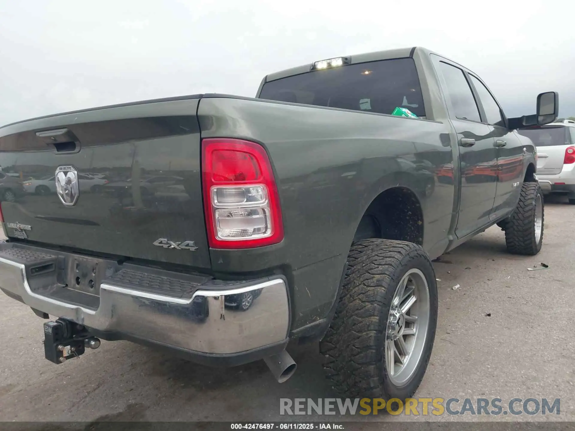 4 Photograph of a damaged car 3C6UR5DL8MG654830 RAM 2500 2021