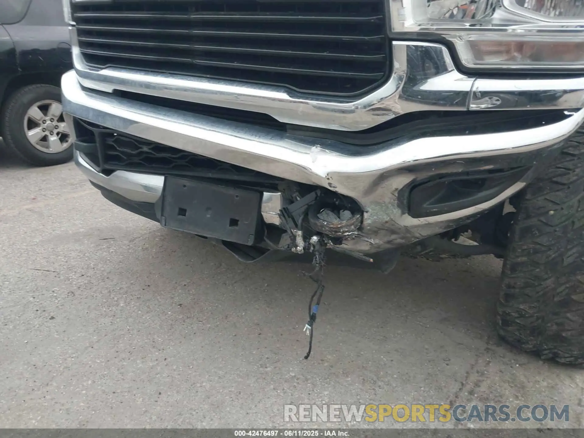 6 Photograph of a damaged car 3C6UR5DL8MG654830 RAM 2500 2021