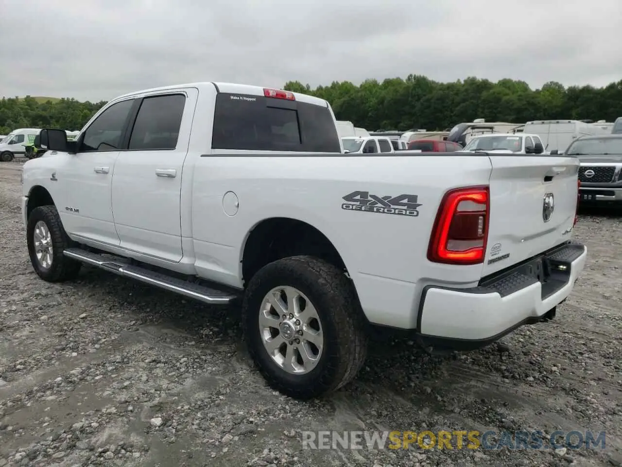 2 Photograph of a damaged car 3C6UR5DL9MG511028 RAM 2500 2021