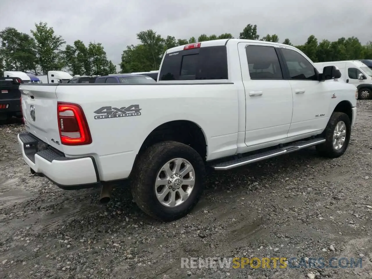 3 Photograph of a damaged car 3C6UR5DL9MG511028 RAM 2500 2021