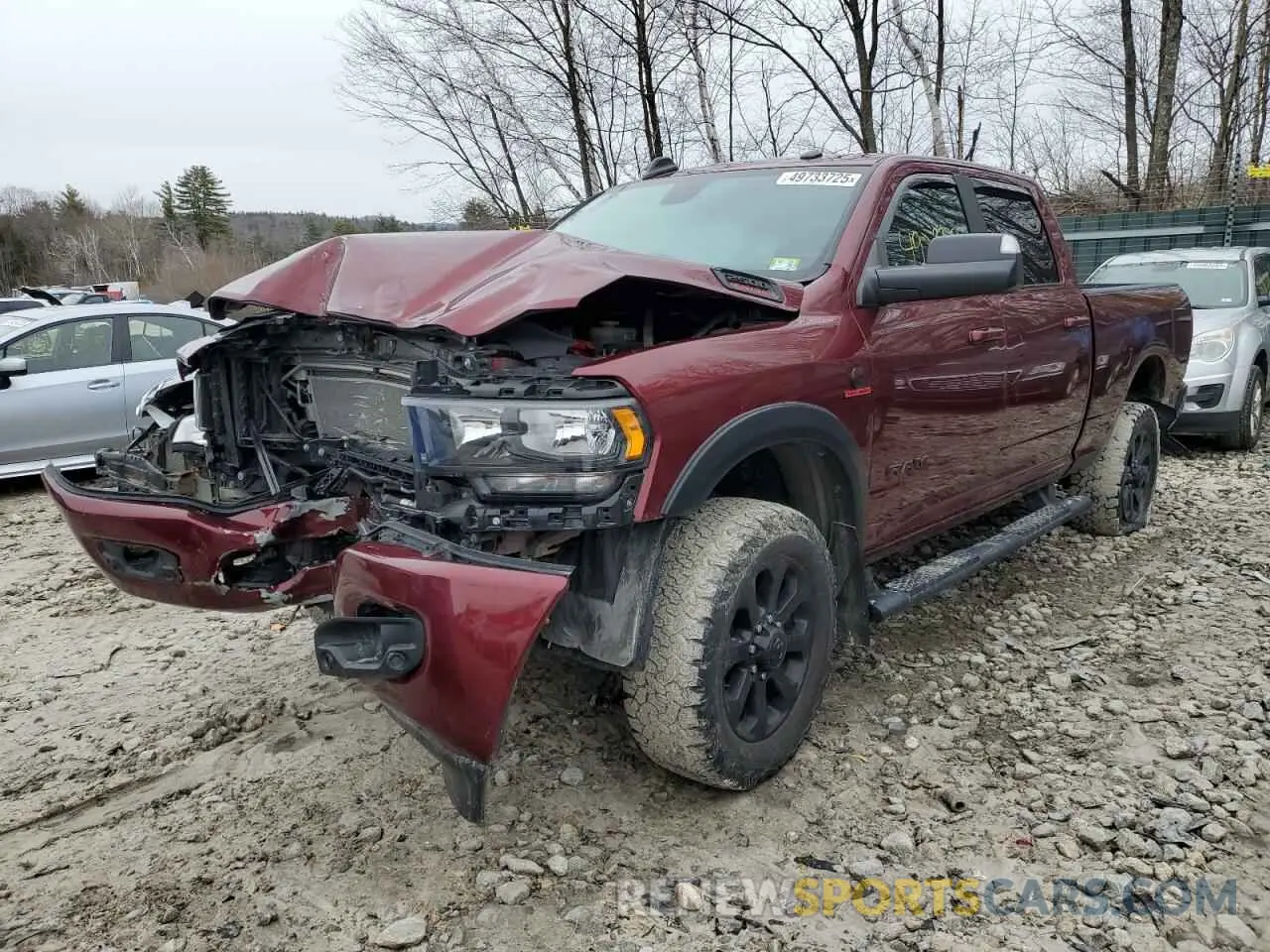 1 Photograph of a damaged car 3C6UR5DL9MG612117 RAM 2500 2021