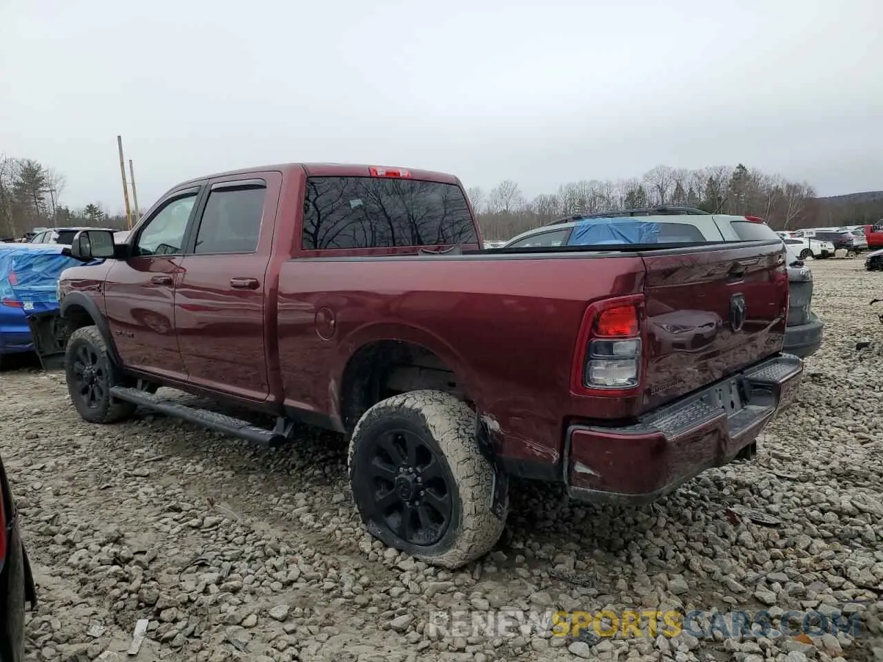 2 Photograph of a damaged car 3C6UR5DL9MG612117 RAM 2500 2021