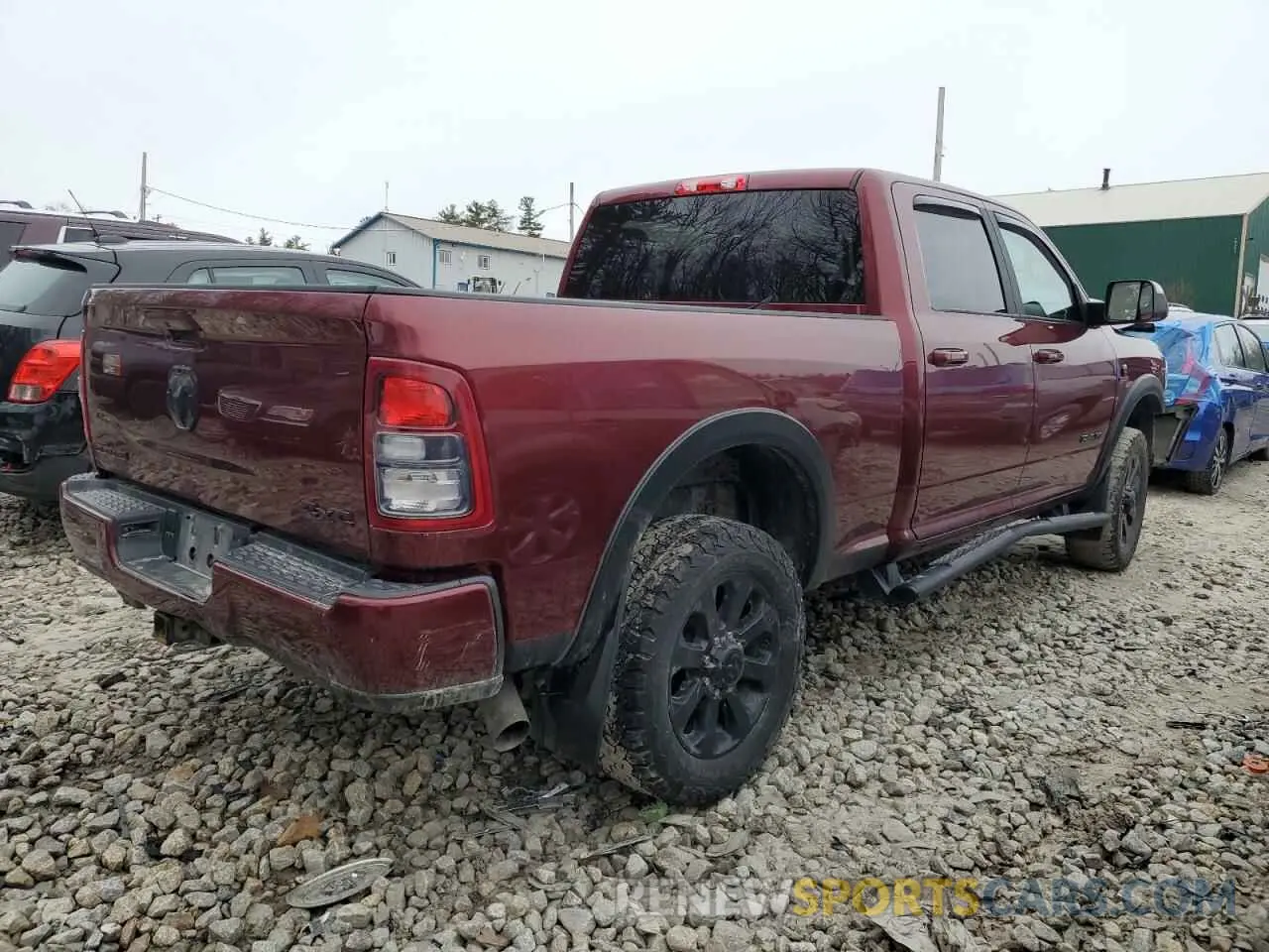 3 Photograph of a damaged car 3C6UR5DL9MG612117 RAM 2500 2021