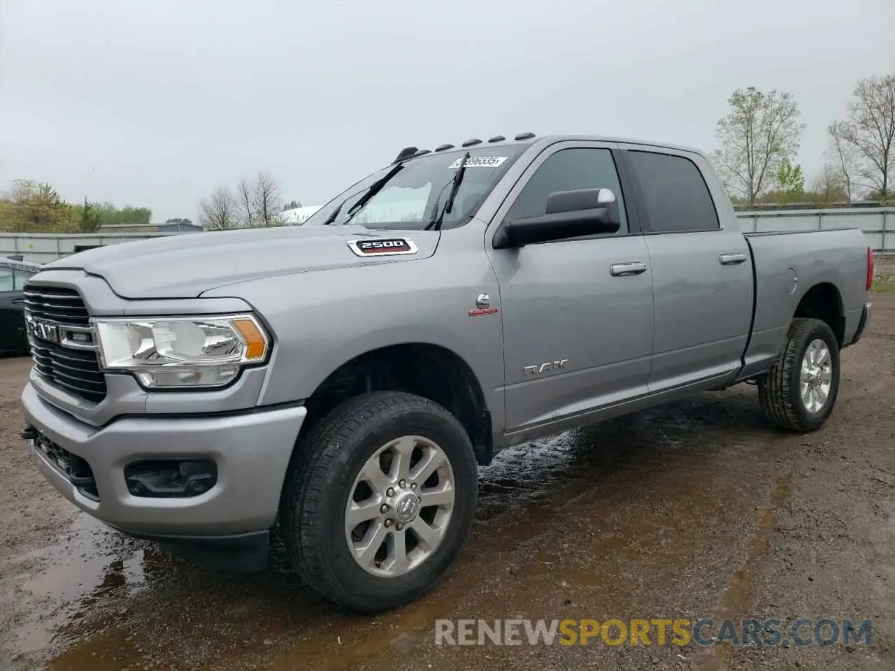 1 Photograph of a damaged car 3C6UR5DLXMG569147 RAM 2500 2021