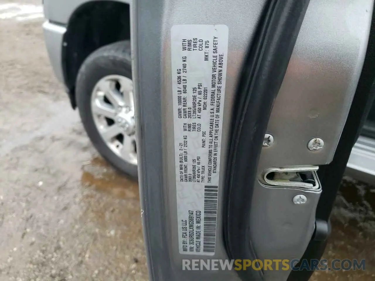 12 Photograph of a damaged car 3C6UR5DLXMG569147 RAM 2500 2021