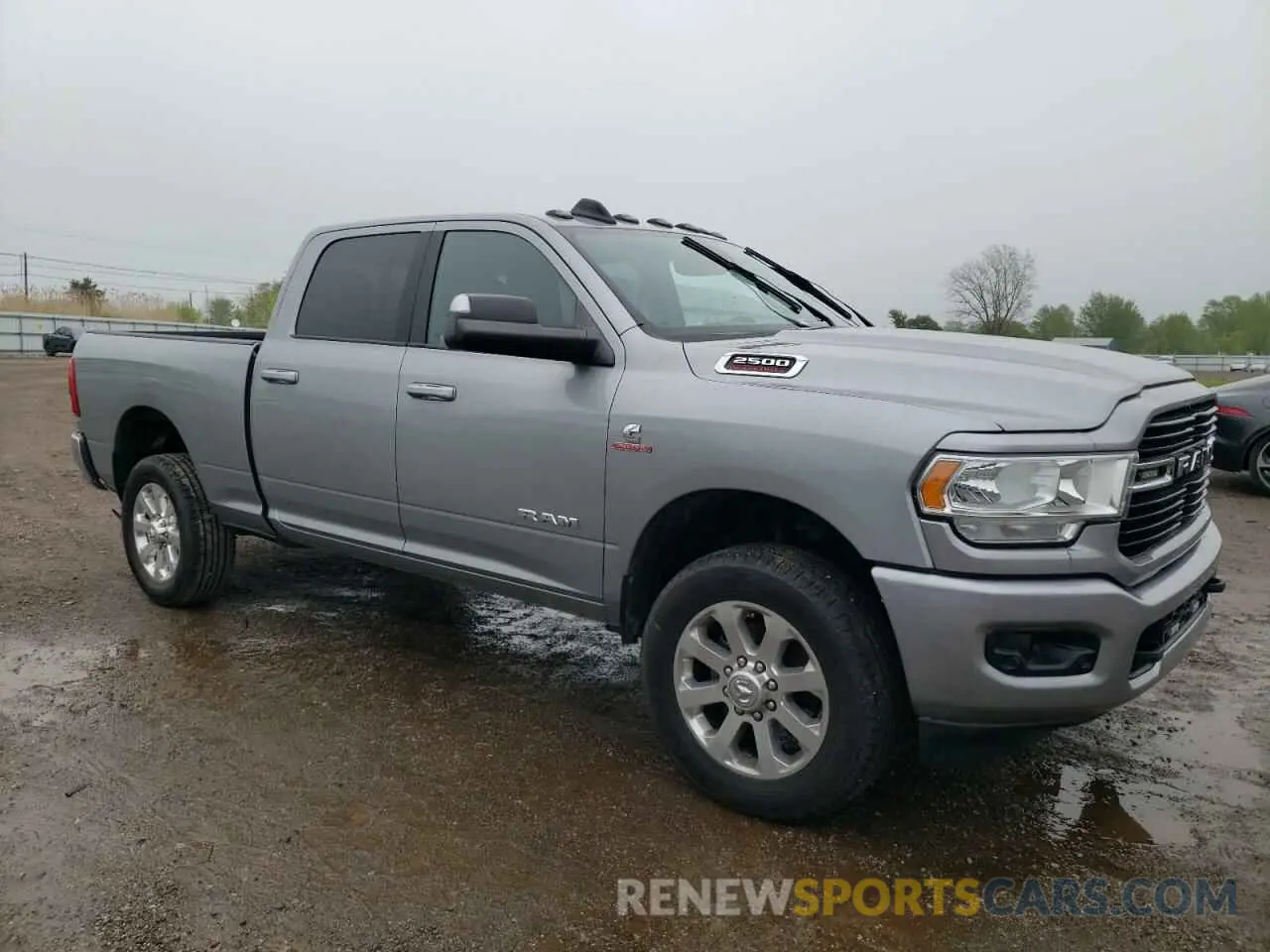 4 Photograph of a damaged car 3C6UR5DLXMG569147 RAM 2500 2021