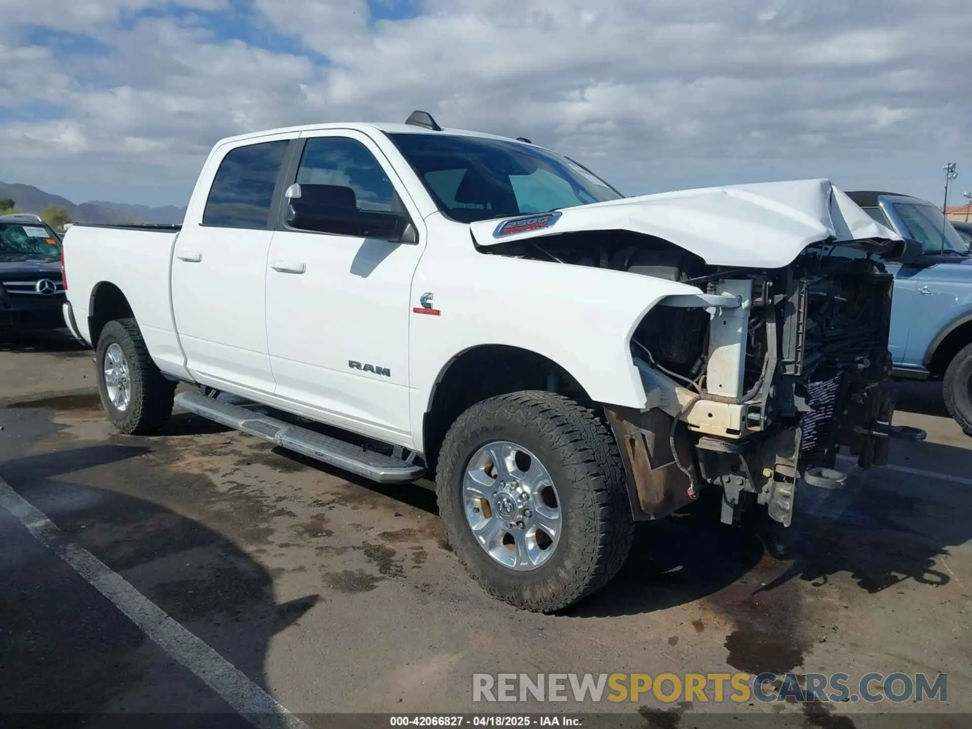 1 Photograph of a damaged car 3C6UR5DLXMG648737 RAM 2500 2021