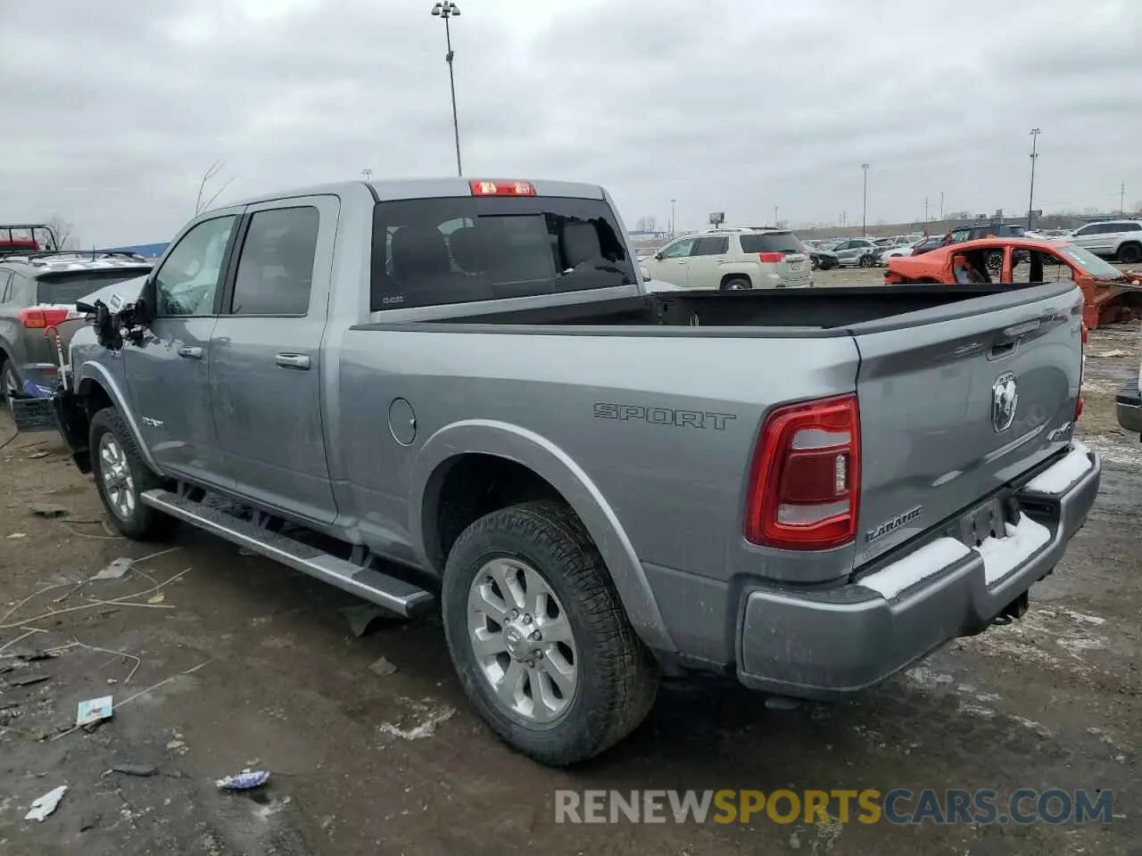 2 Photograph of a damaged car 3C6UR5FJXMG693012 RAM 2500 2021