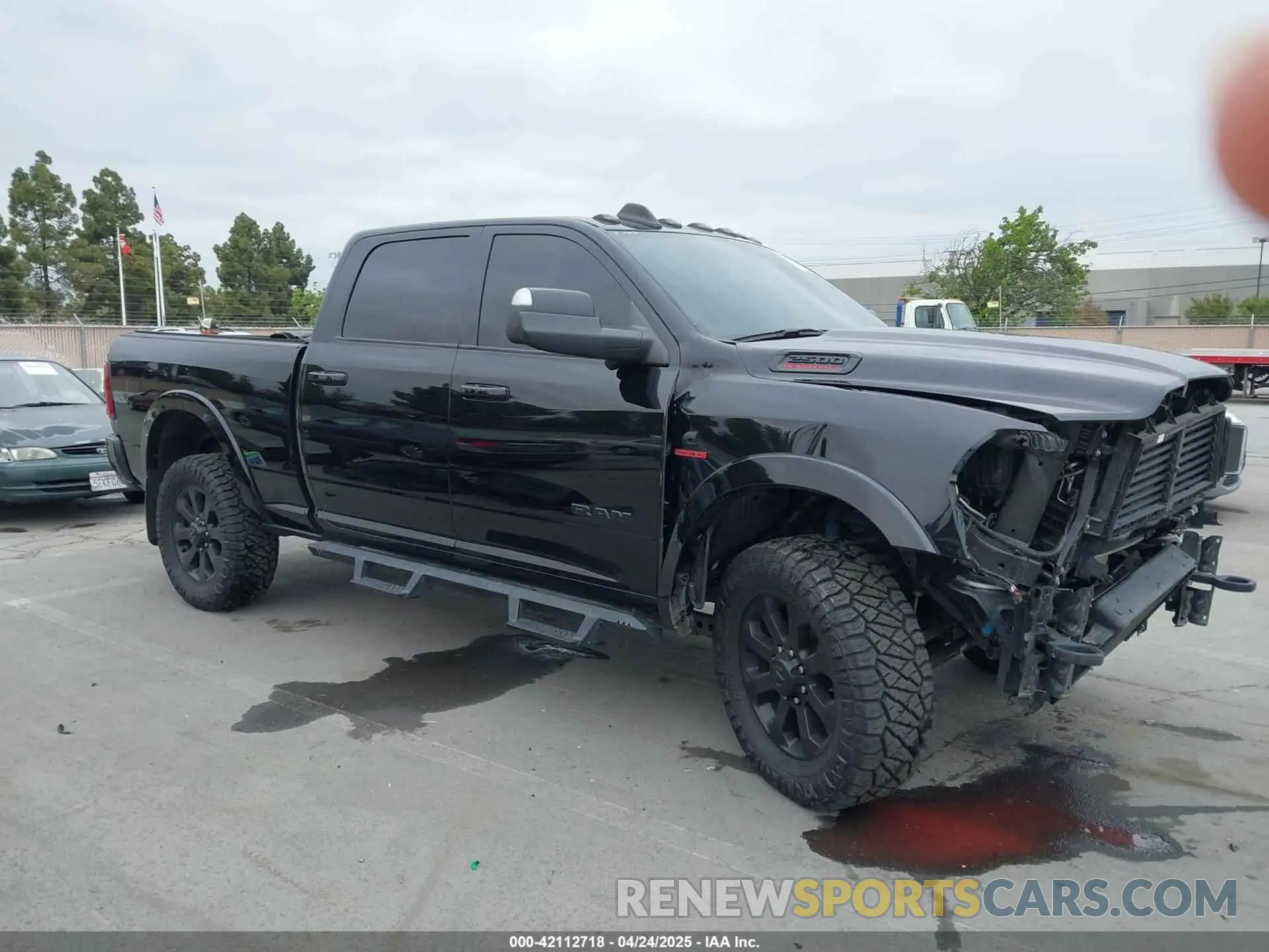 1 Photograph of a damaged car 3C6UR5FL0MG502845 RAM 2500 2021
