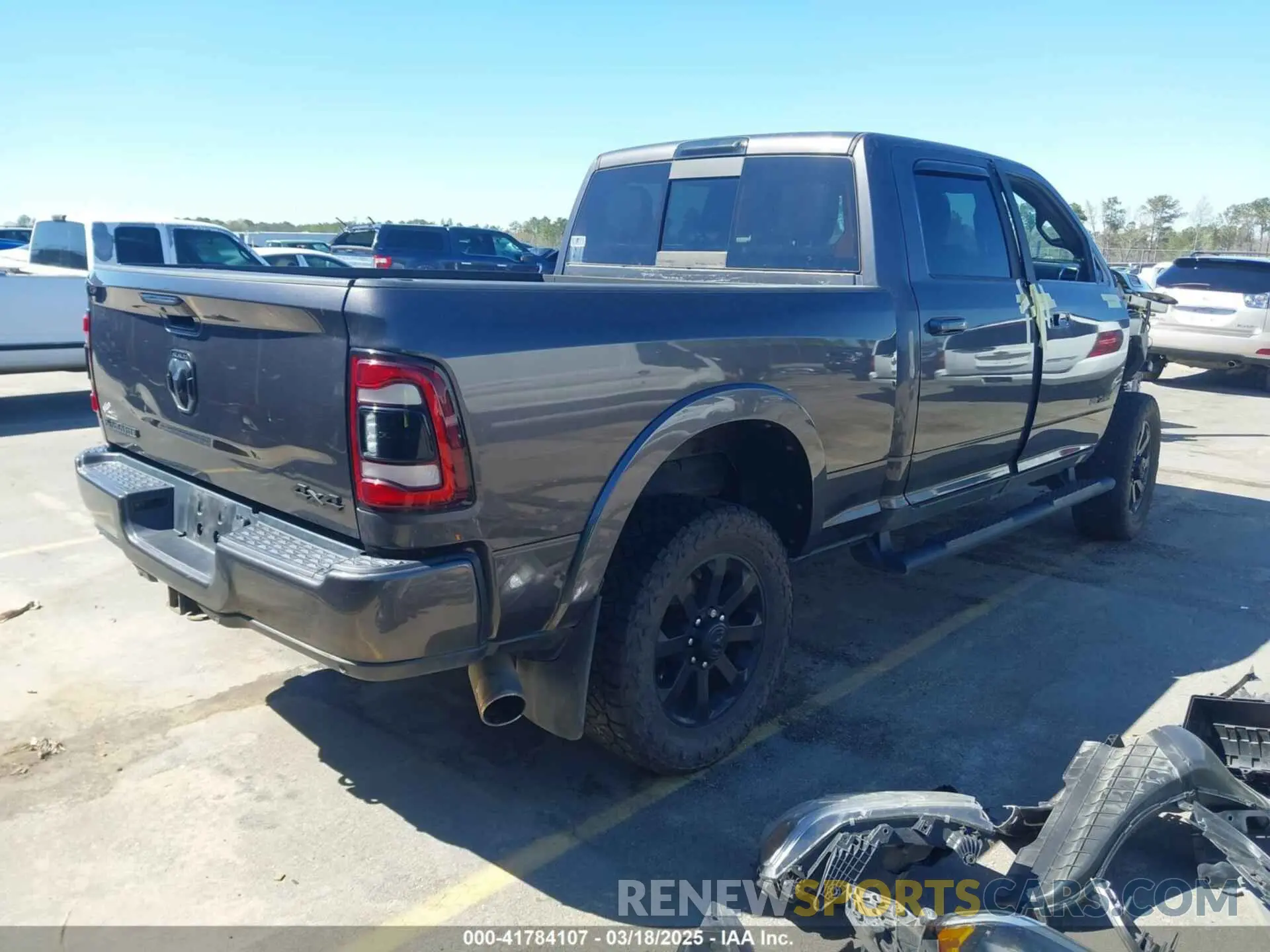 4 Photograph of a damaged car 3C6UR5FL1MG559426 RAM 2500 2021