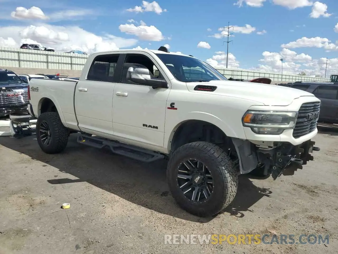 4 Photograph of a damaged car 3C6UR5FL2MG591673 RAM 2500 2021