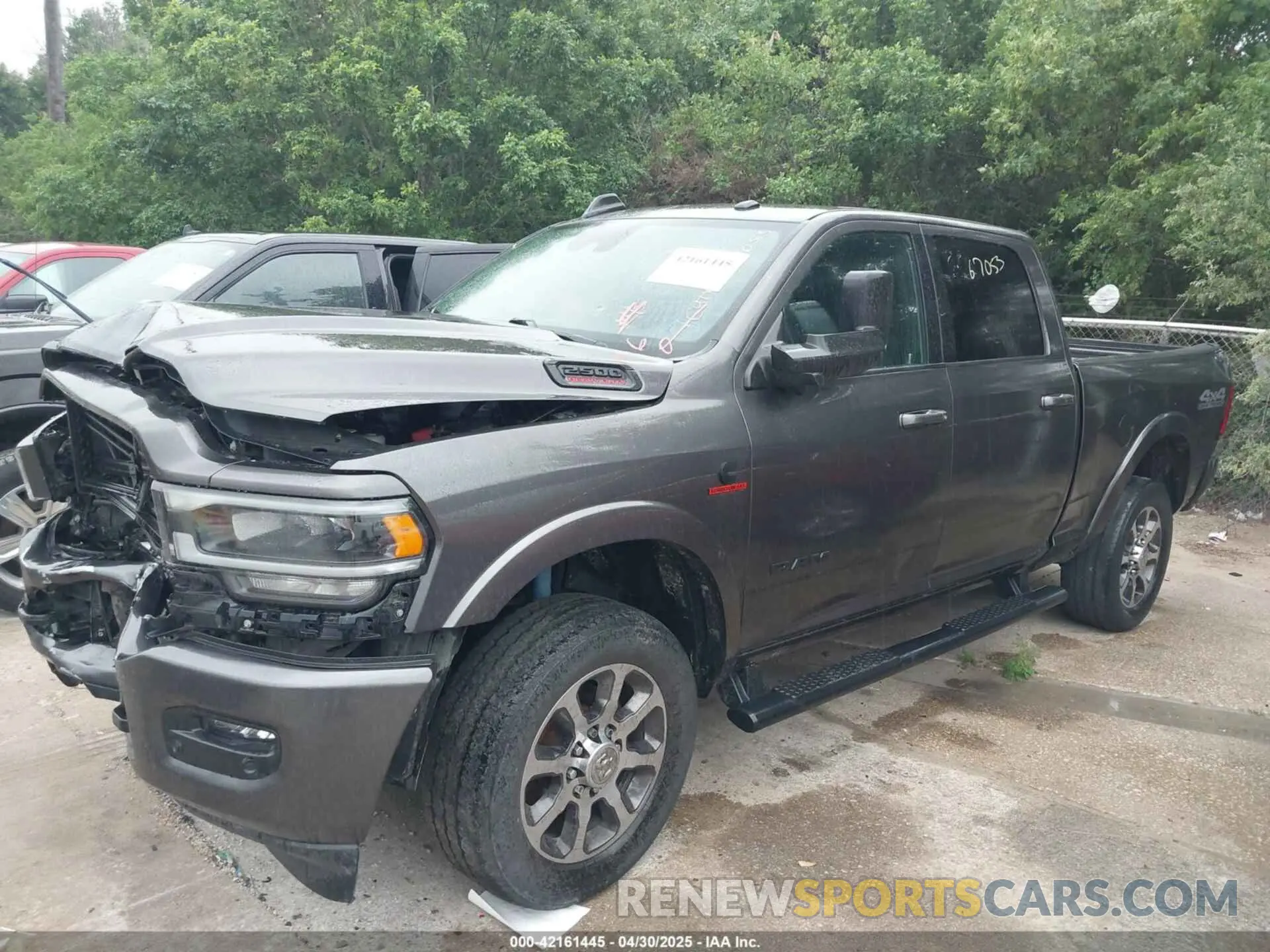 2 Photograph of a damaged car 3C6UR5FLXMG590626 RAM 2500 2021