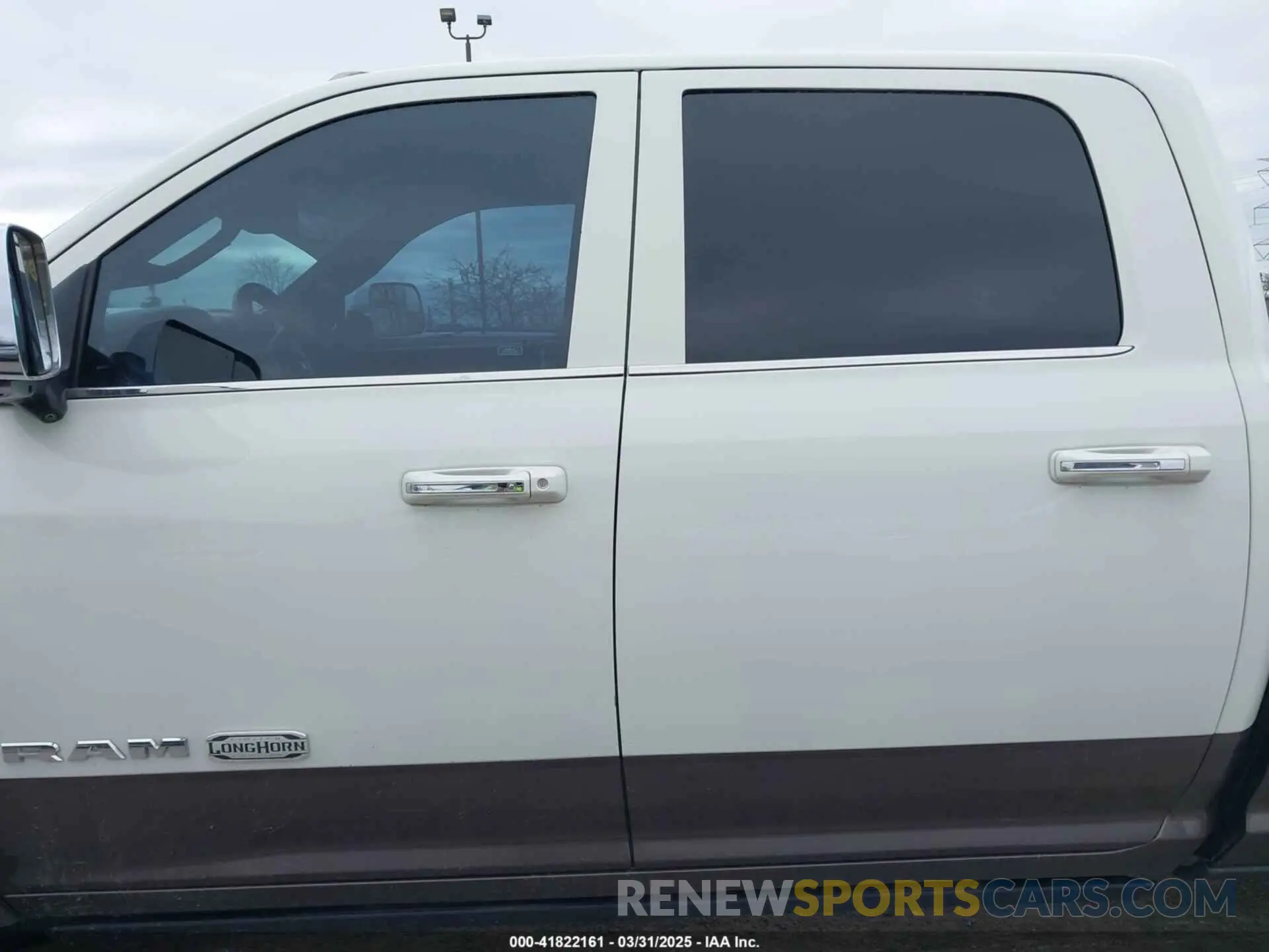 14 Photograph of a damaged car 3C6UR5GL7MG557307 RAM 2500 2021