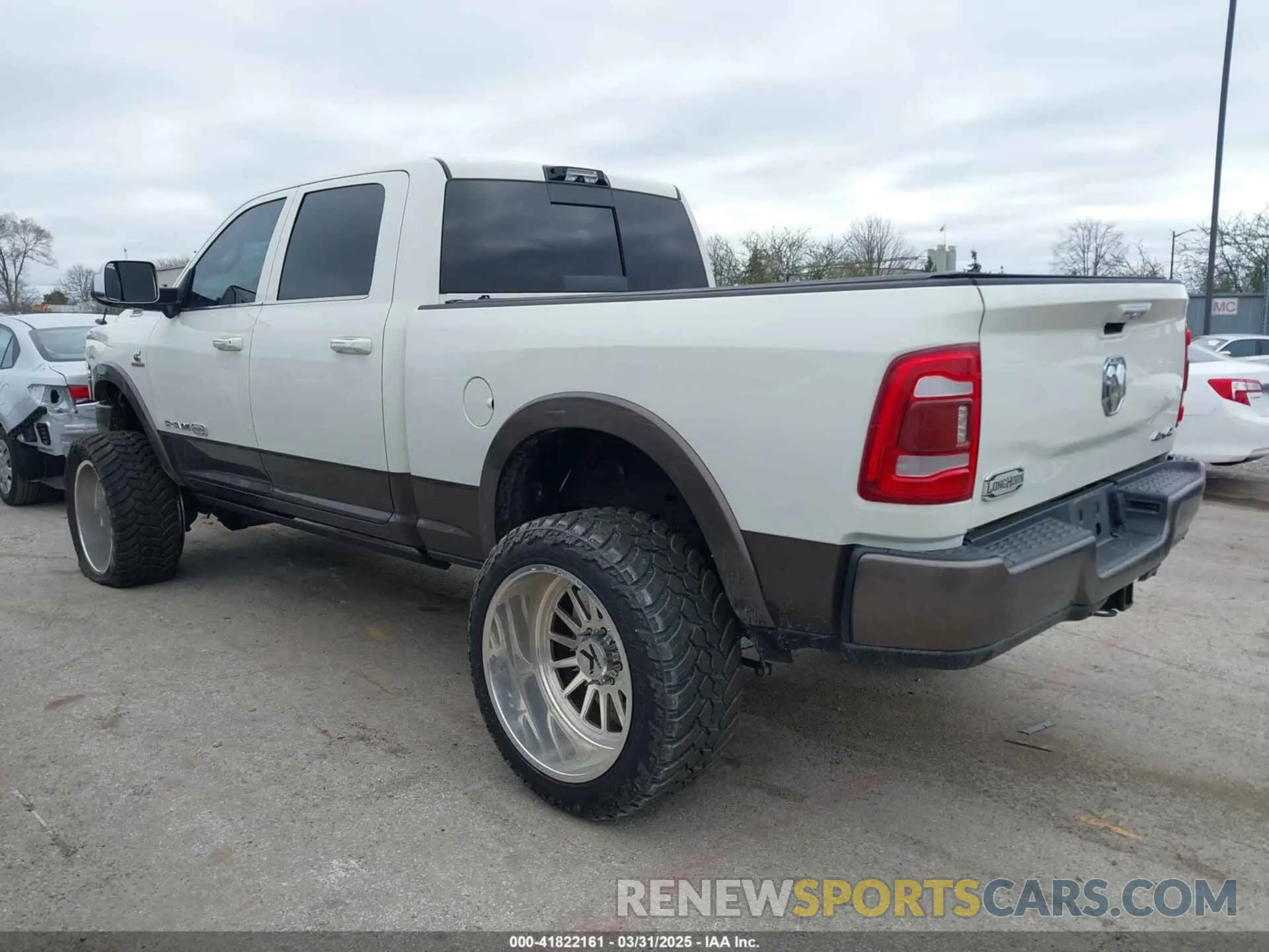 3 Photograph of a damaged car 3C6UR5GL7MG557307 RAM 2500 2021