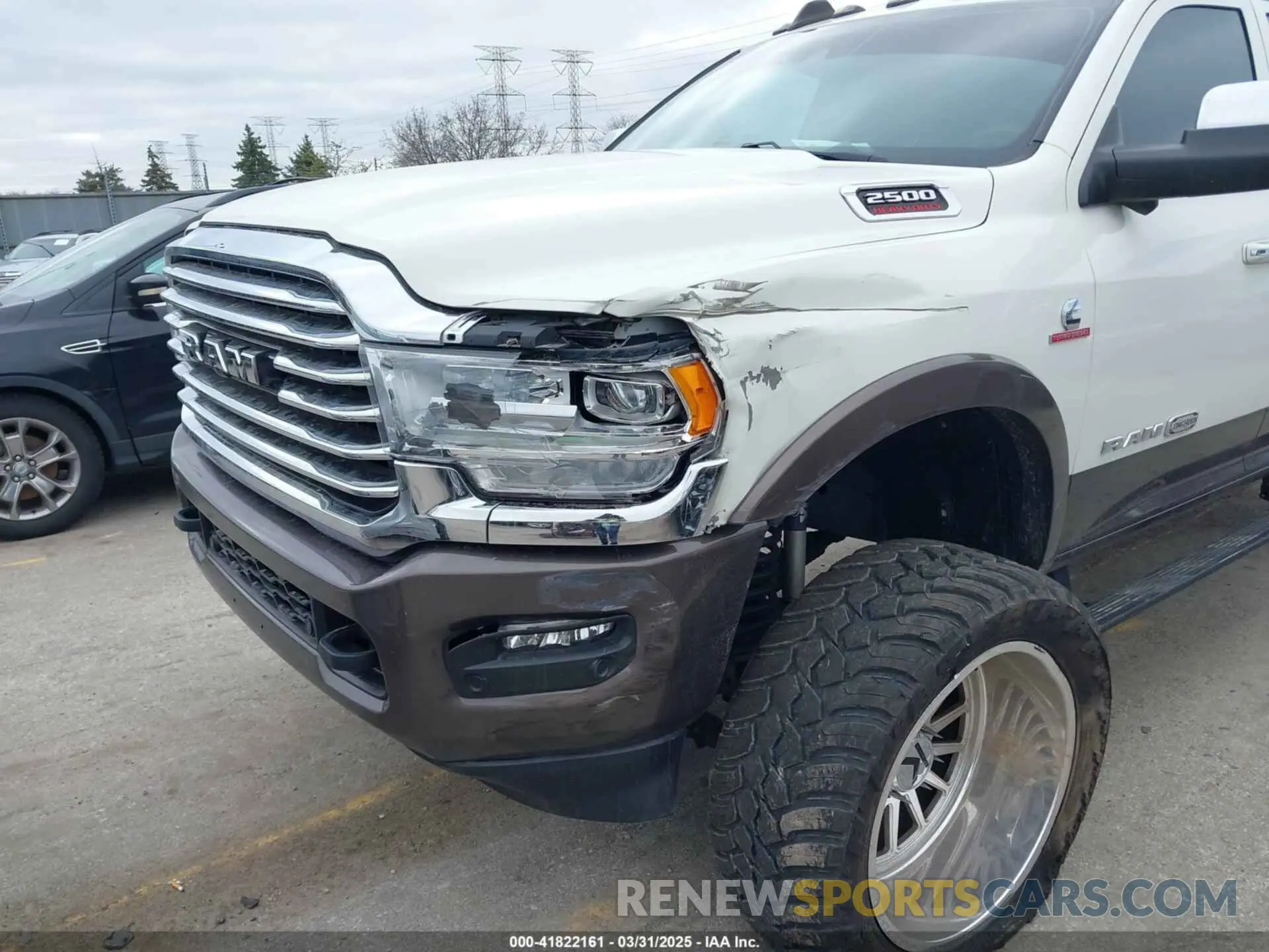 6 Photograph of a damaged car 3C6UR5GL7MG557307 RAM 2500 2021