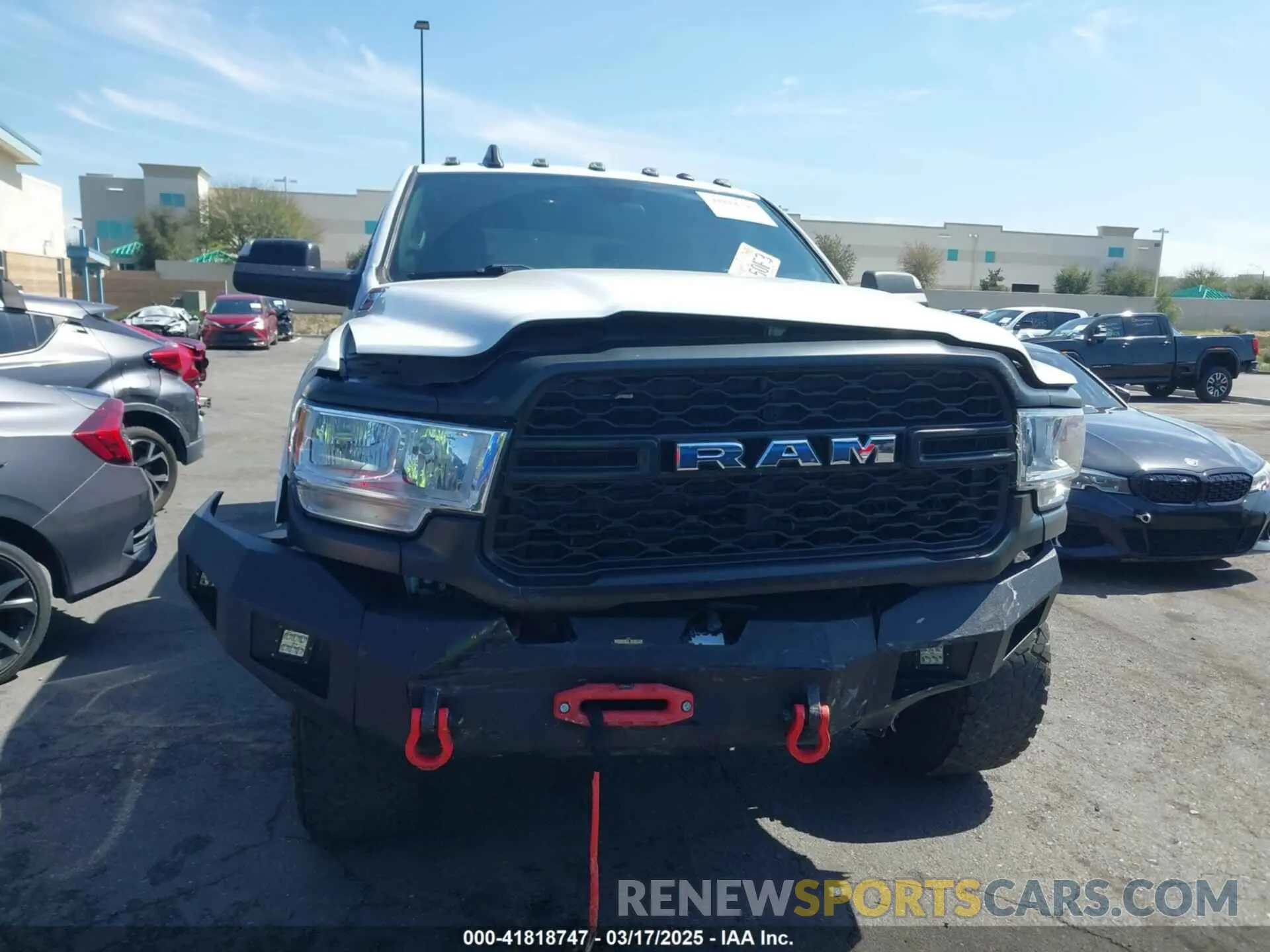 6 Photograph of a damaged car 3C6UR5HJ5MG606694 RAM 2500 2021