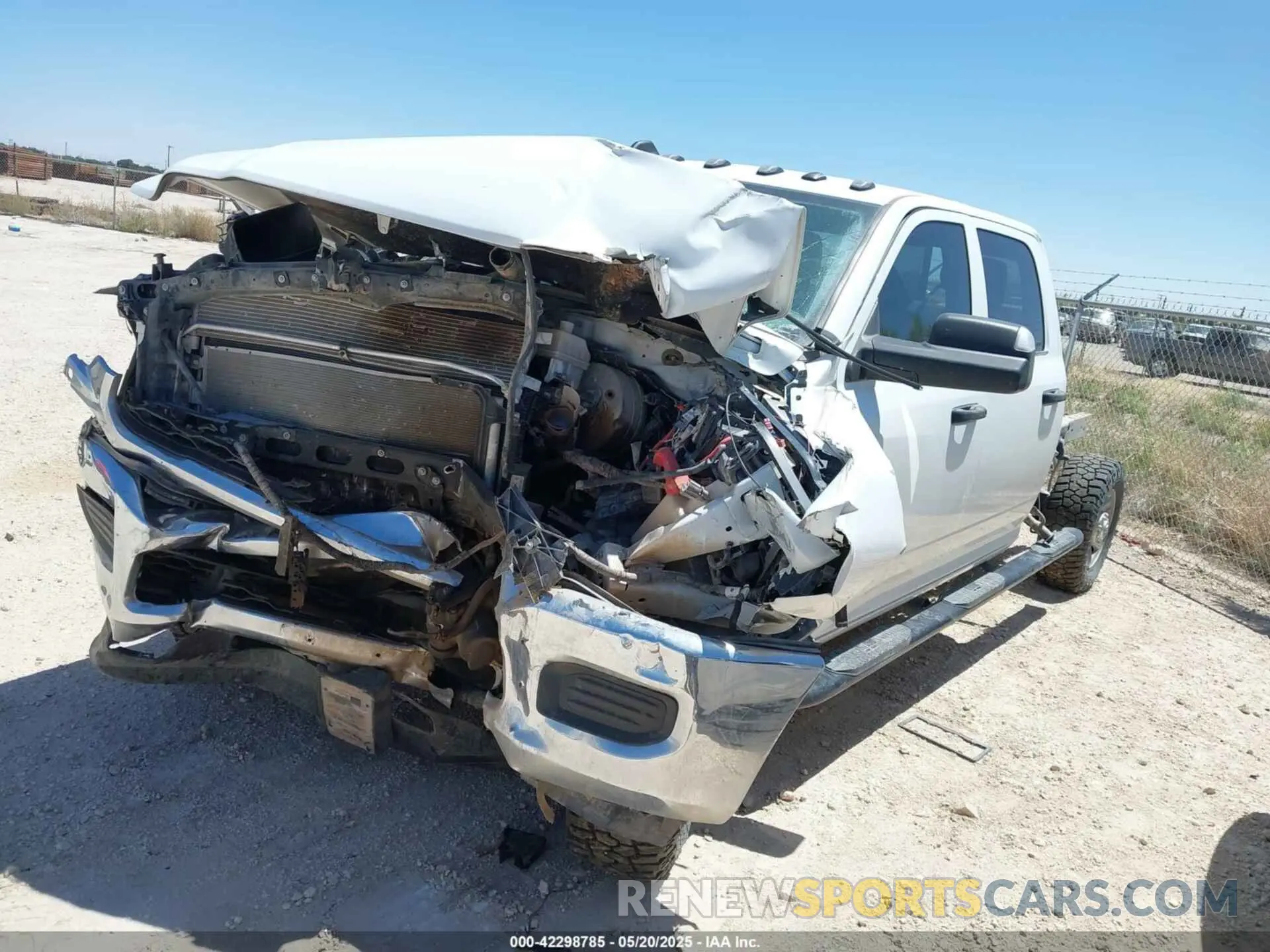 2 Photograph of a damaged car 3C6UR5HJ6MG698589 RAM 2500 2021