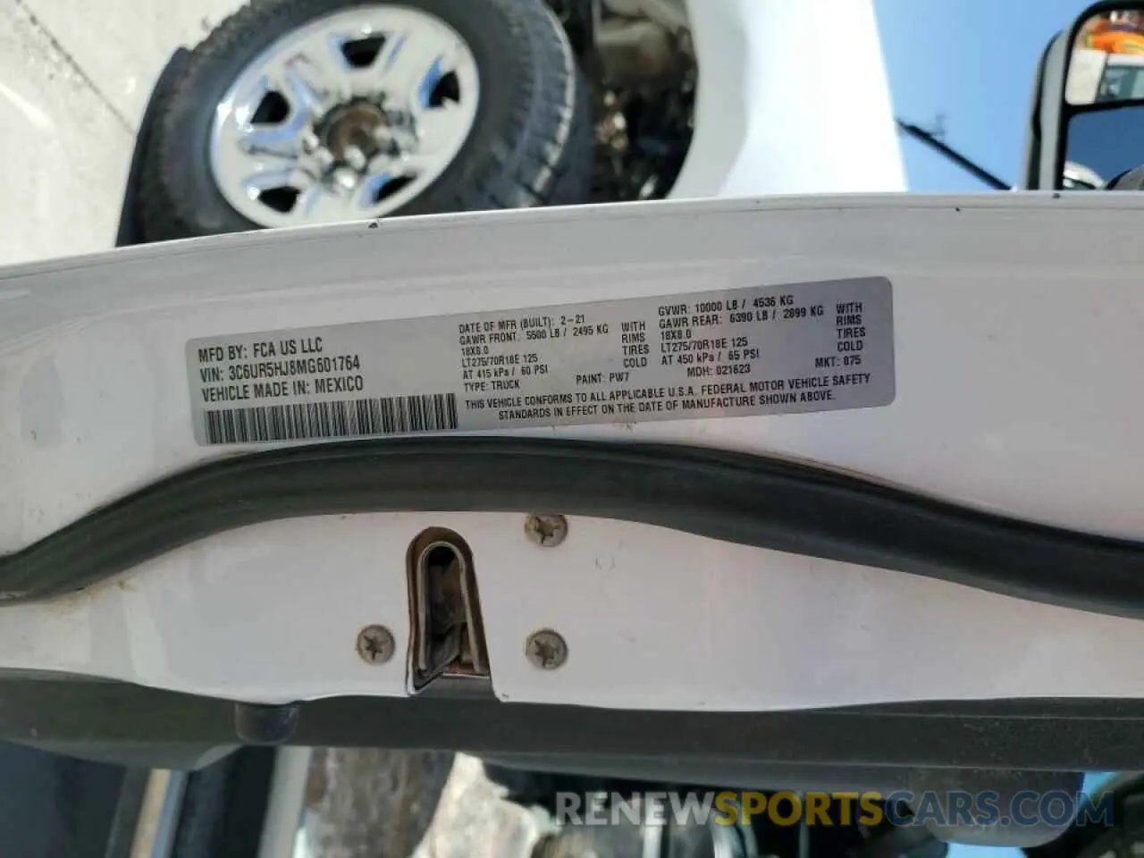 13 Photograph of a damaged car 3C6UR5HJ8MG601764 RAM 2500 2021