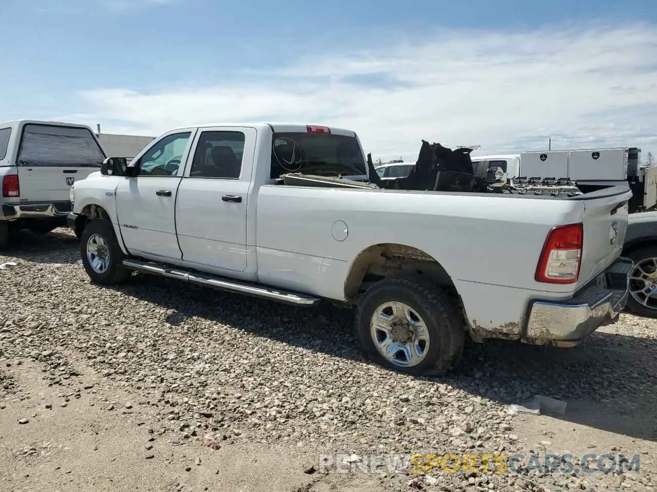 2 Photograph of a damaged car 3C6UR5HJ8MG601764 RAM 2500 2021