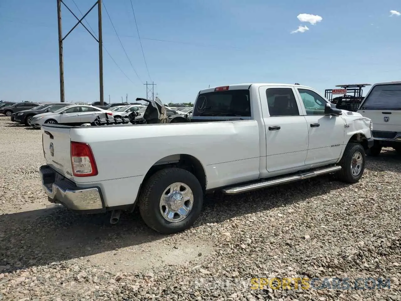 3 Photograph of a damaged car 3C6UR5HJ8MG601764 RAM 2500 2021