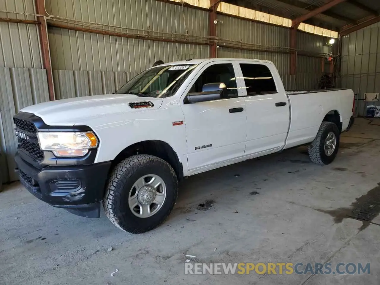 1 Photograph of a damaged car 3C6UR5HJXMG520152 RAM 2500 2021