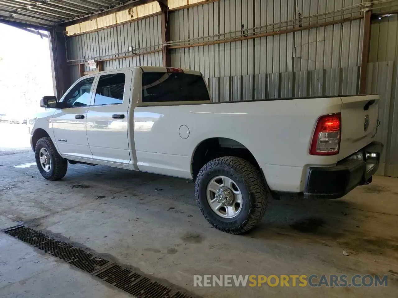 2 Photograph of a damaged car 3C6UR5HJXMG520152 RAM 2500 2021